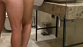 brunette babe gets fucked doggystyle in bathroom at college party creampie