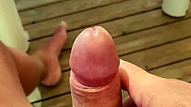 Solo guy masturbates monster cock near orgasm on terrace