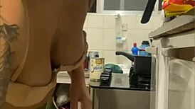 Live in kitchen, mini skirt flashing swollen pussy