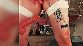 Redhead cosplayer sucks dildo then rides sex machine.