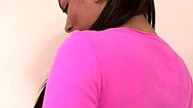 stunning brunette strips in bedroom, teasing with outfits and self-touch