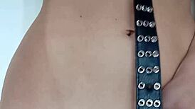 i'm spanking my pussy with a belt a little