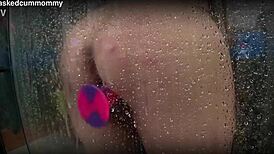 Spied on my chubby roommate using new dildo in shower. Almost dropped phone avoiding detection.