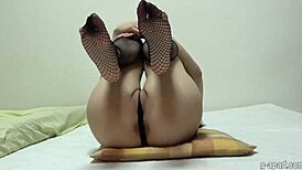 Japanese girl airi in fishnet stockings exercising in a micro thong