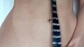 i'm spanking my pussy with a belt a little