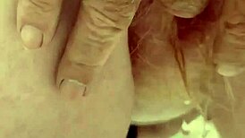 Redhead pees through her hairy pussy in this raw fetish scene.