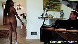 black stepdaughter bent over piano for doggystyle