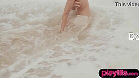 Petite Australian MILF slowly undresses to reveal her round tits and sandy bubble butt in a sensual striptease.