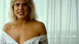 Petite Australian MILF slowly undresses to reveal her round tits and sandy bubble butt in a sensual striptease.