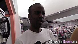 Teen at gloryhole swaps jizz while sucking big black cock 😜