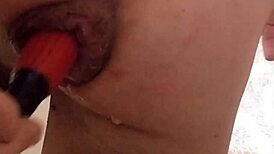 My prolapse leaks natural lubricant while I squirm from intense anal stretching!