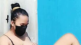 Gadis in bikini masturbates with dildo solo.