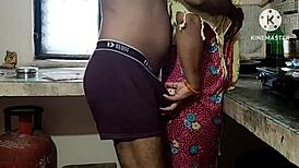 Desi Bhabhi Engages in Hardcore Fucking in the Kitchen, Sucking Monster Cock and Using Banana for Dirty Play