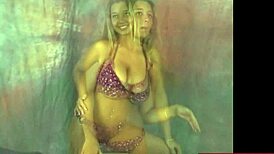 Busty Christina Dancing in Purple Bikini