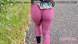 Ebony Woman with Large Butt in Leggings Running Alone in the Forest