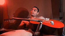 Muscular Asian bodybuilder plays Yamaha guitar in China