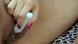 Janessa Jordan and her friend, red-haired lesbians, putting on a sex toy?