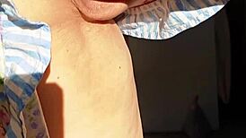 mature woman spreads her huge labia for close-up flashing in homemade video