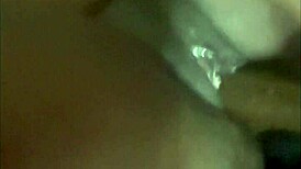Wet ebony pussy gets fucked hard by a big dildo in solo play.
