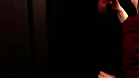 Student eagerly sucks cock through the gloryhole