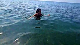 Chat On The Beach Between Voyeurs And Passers-By