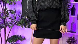 Sexy MILF straps into intense leather harness!