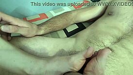 girlfriend giving a foot job and handjob until her feet are full of cum?