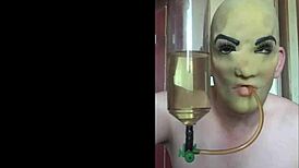 Masked Bisexual Lover Swallows Piss