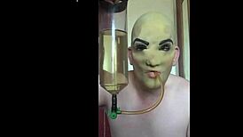 Masked Bisexual Lover Swallows Piss