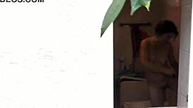 Sexy Wife's Public Outdoor Shower Draws Neighbor's Gaze as She Strokes Wet Pussy and Big Ass