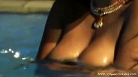 pretty asian woman gently cleanses her naked body