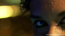 pretty asian woman gently cleanses her naked body