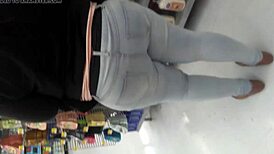 Filming the chubby woman shopping at the supermarket casually