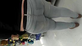 Filming the chubby woman shopping at the supermarket casually