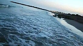 blonde teases with tits then drops for public beach cock suck