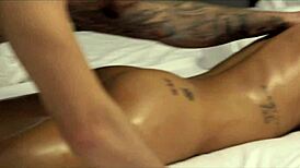 Hey check out this tattooed blonde MILF getting oiled up kissed and pussy licked by Damon