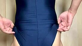 Japanese swim club girl in swimsuit gets anal trained with buttplug and spanking