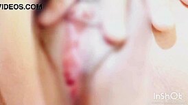 bound babe teases clit to squirting orgasm in bondage play