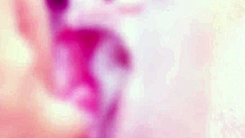 bound babe teases clit to squirting orgasm in bondage play