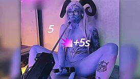 Beautiful cosplayer glasses tattoo pierces nipples with huge dildo vibrator machine to explosive orgasm