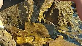 nina black gets horny peeing right by the sea outdoors