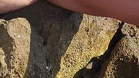 nina black gets horny peeing right by the sea outdoors