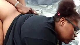 Nerdy ebony shakes fat ass outdoors in public park