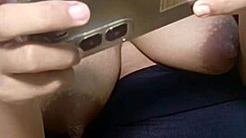 Naked housewife plays video game with huge exposed pussy on display