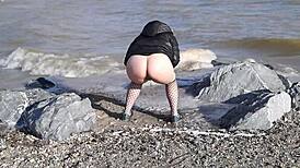 Milf Hairspray Pisses Wild In Sea Outdoors!