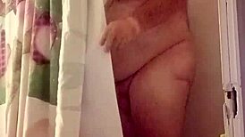 Watch Her Stroke Massive Cock in Steamy Shower Bathing Session!