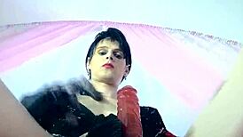 shemale grabs dildo dreams of men cums hard in glass then drinks every drop of her own sperm