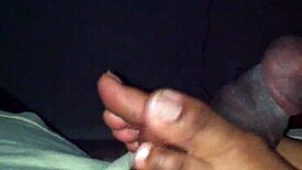 ebony babe strokes black cock with her sexy feet