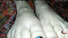 i oil up my tattooed feet and stroke your cock with perfect footjob grips