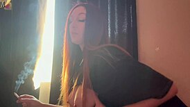 Italian milf artemisia flashes huge tits while smoking cigarette